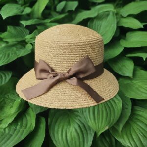 Cloche hat on leaves